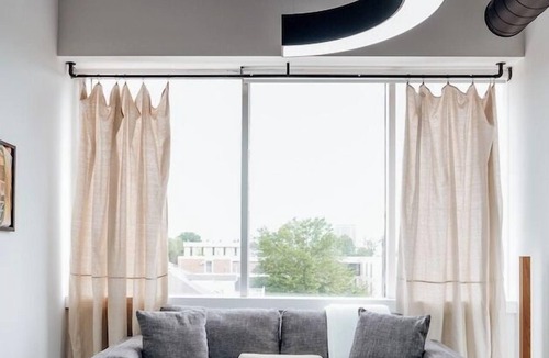 Montgomery Apartment | Step-free entry, an elevator to your door, and Capitol views from the second floor of a converted downtown bank.
