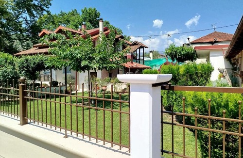Polykarpion Ski Chalet | "The plane trees"