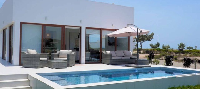 Beachfront Elegance: Private Pool & Steps to Shore in Chincha Baja