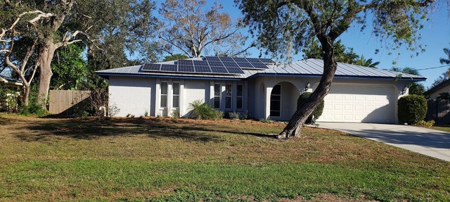 Comfortable updated 3 bedroom home - enclosed, solar heated pool, private yard. in Sarasota
