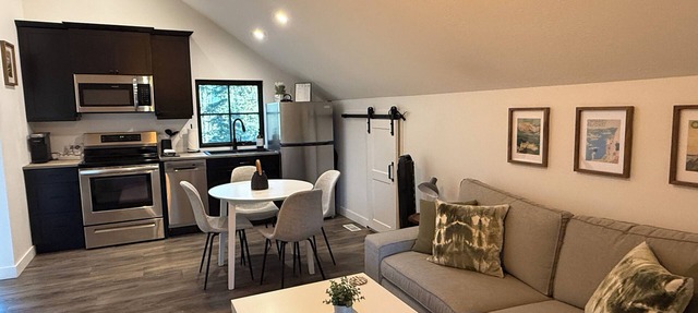 Cozy farmhouse style loft with lake access! in Spring Lake