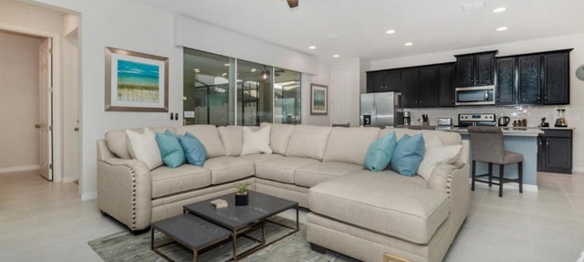 Discover Unparalleled Elegance Our Newest Candlelight Pool Home in Kissimmee