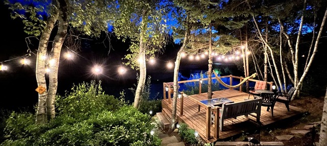 Luxurious secluded rustic wooden chalet on edge of tranquil pond next to beach. in Beaubassin-est