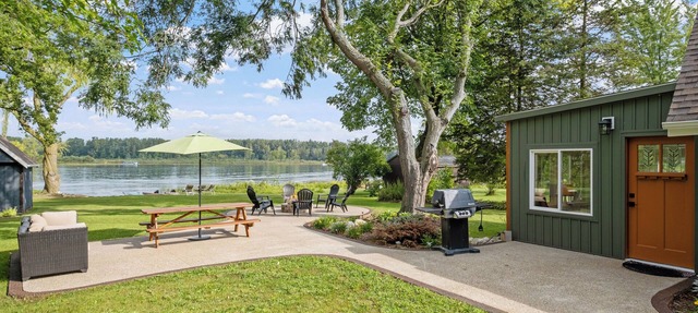Murray Lake Waterfront Retreat w/Dock, Patio & Fire Pit in Lowell