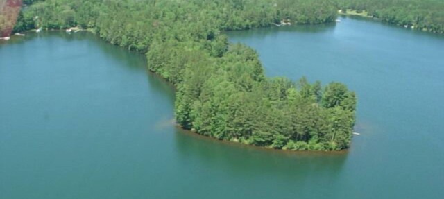 Private Lakefront home on Peninsula of Pristine Big Bass Lake in Remer