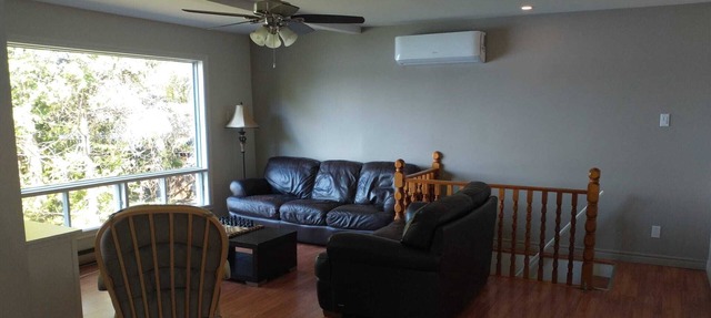 Serene waterfront 4 bdrm/2 bath cottage with wifi/hot tub/deck/bbq/firepit/dock in Notre-Dame-de-Pontmain