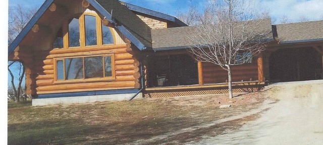 Three level Log Home on Private 40 Acre Estate. in Swift Current