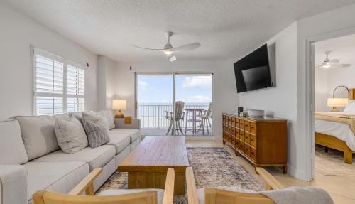Updated direct oceanfront corner 2/2 with stunning beach views, a heated pool, and parking garage in Ormond Beach