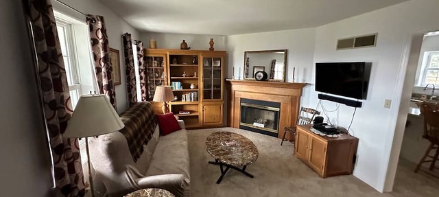 Quaint Cape Cod attached home nestled atop a hill near Speedwell Forge Lake in Lititz